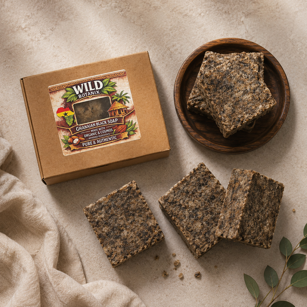 Wild Botanix Ghanaian Black Soap Bar 100g flat lay with kraft box and soap bars